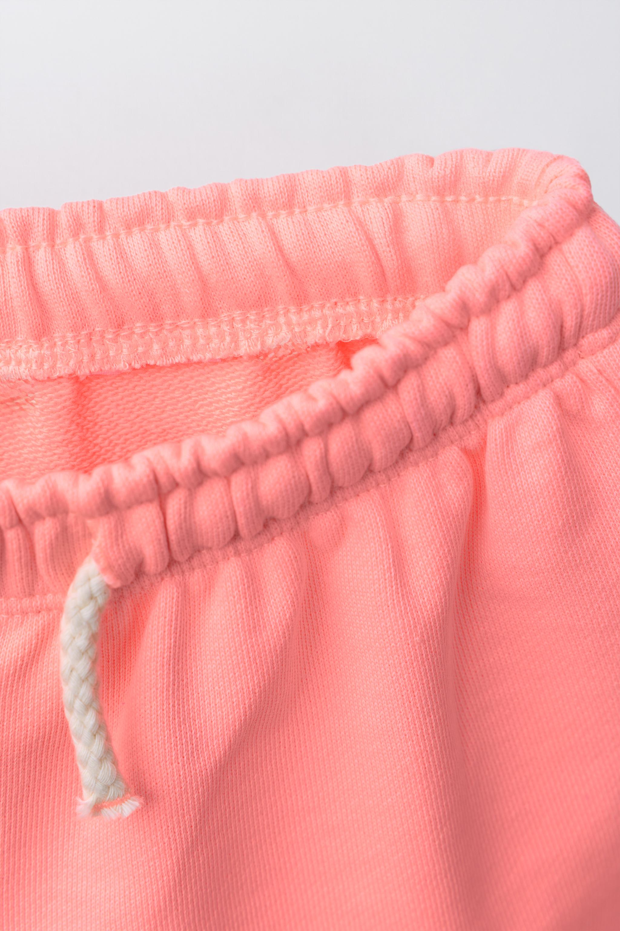 SWEATSHIRT AND RUBBERIZED FLOWER BERMUDA SET